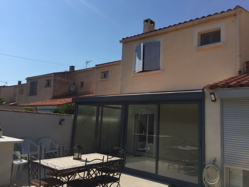 Véranda avec porte coulissante sur Châteauneuf-les-Martigues